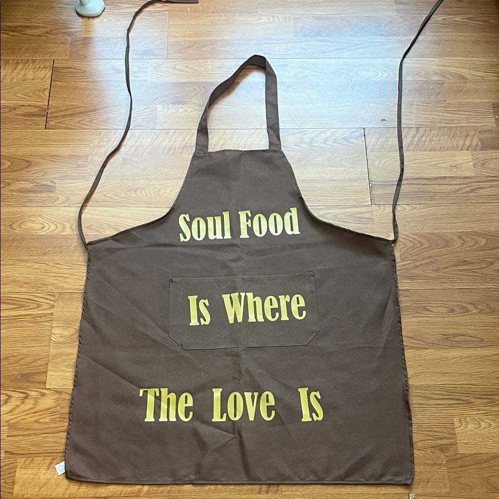 Brown Apron with Yellow Text by [Brand]